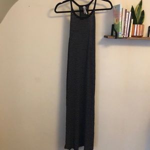 Black and white striped fitted mid-length dress